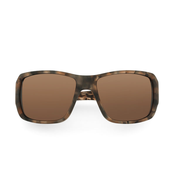 Sunglasses with tortoiseshell frame and brown lenses on a white background